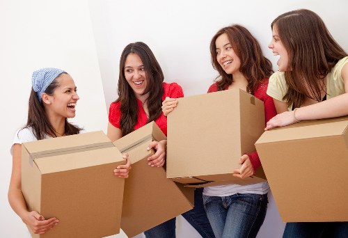 Furniture being carried through a Pimlico property