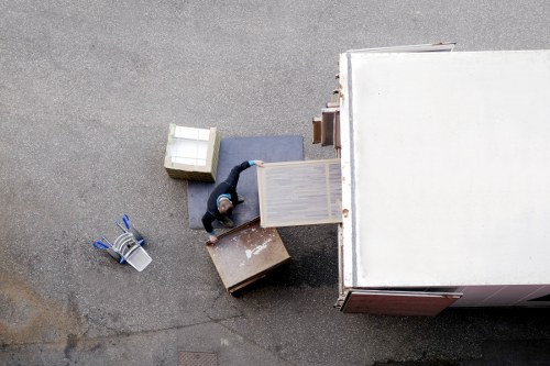 Removal van loading items outside a Pimlico apartment building