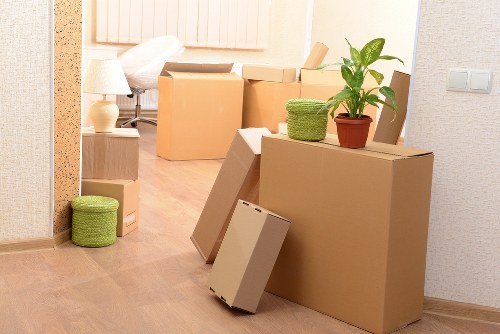 Local moving team handling boxes and household items in Pimlico