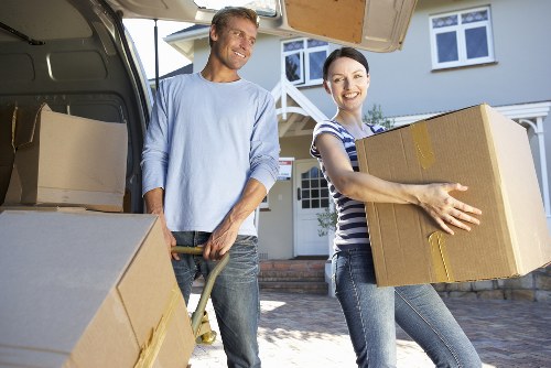 Professional team collecting old furniture from a Pimlico residential property